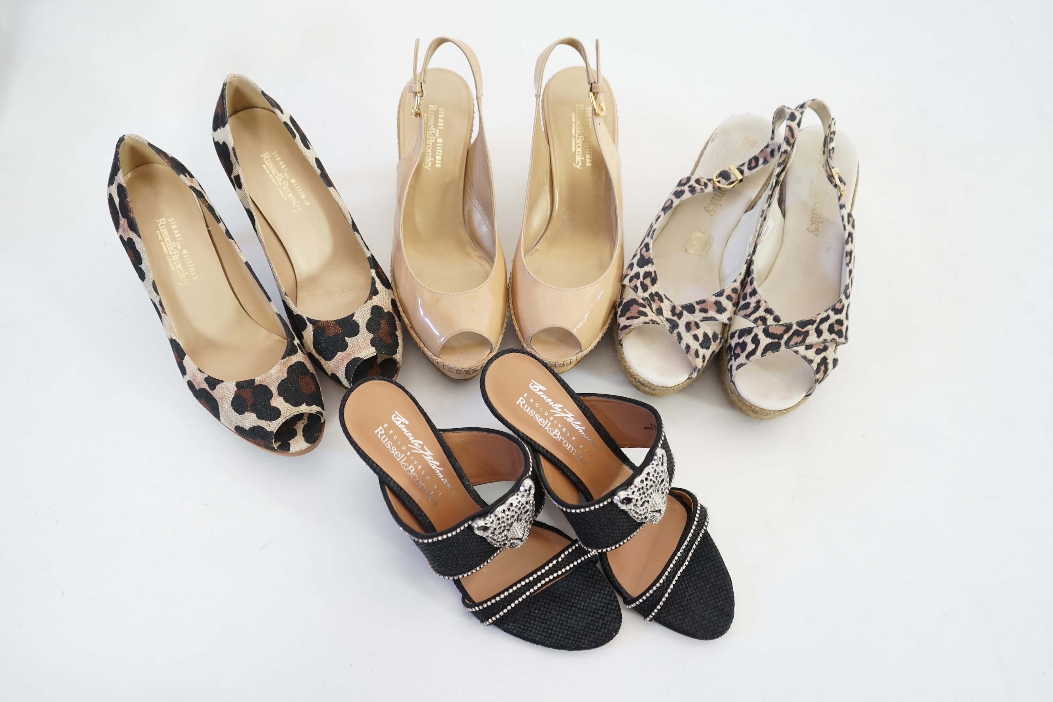 Four pairs of Russell & Bromley lady's heeled sandals, all size 38/38.5. Proceeds to Happy Paws Puppy Rescue